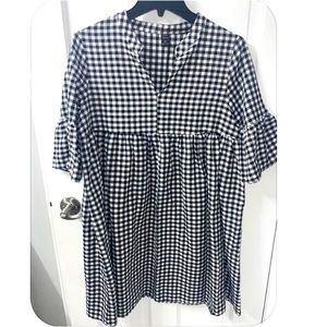 Black and white baby doll dress.80% polyester and 20% cotton